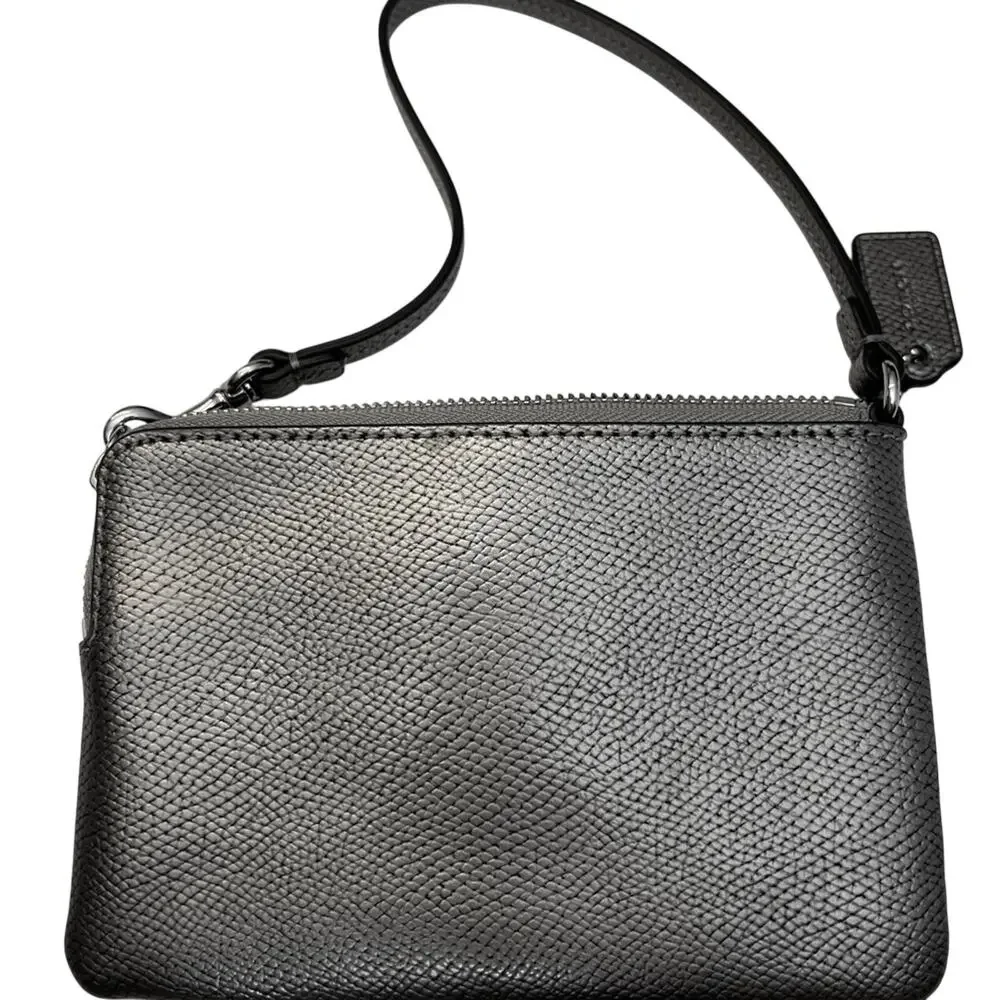 EUC Coach Metallic Silver Wristlet with Bow Detail